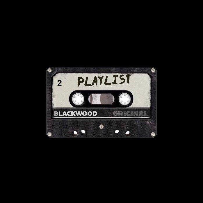 an old black and white cassette with the words playlist written on it's side