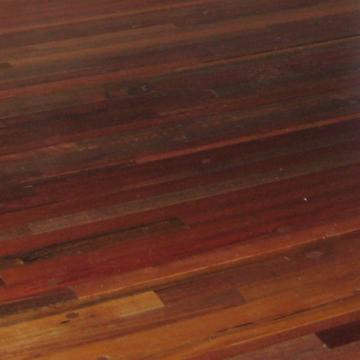 a wooden floor that has been stripped and stained