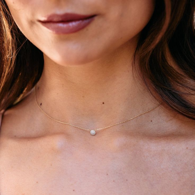 Add a touch of elegance to any outfit with the Marlow 14k Gold Diamond Necklace. Featuring a stunning diamond pendant on a delicate 14K gold chain, this necklace is the perfect combination of luxury and sophistication. Elevate your style and make a statement with this beautiful piece. Available in 14k yellow gold Pendant size: 4mm Lab Grown Diamonds Diamond size: 1mm round diamond 16" cable chain with 2" extender Spring Ring closure SKU: BYND0012 Elegant Gold Plated Round Birthstone Necklace, Elegant 14k Gold Pendant Birthstone Necklace, Minimalist 14k Gold Diamond Necklace With Accents, Elegant 14k Gold Birthstone Pendant Necklace, Rose Gold Necklace With Single Diamond In 14k Gold, 14k Gold Solitaire Necklace With Delicate Chain, Rose Gold 14k Gold Solitaire Necklace With Delicate Chain, 14k Rose Gold Necklace With Single Diamond, Rose Gold 14k Gold Necklace With Single Diamond