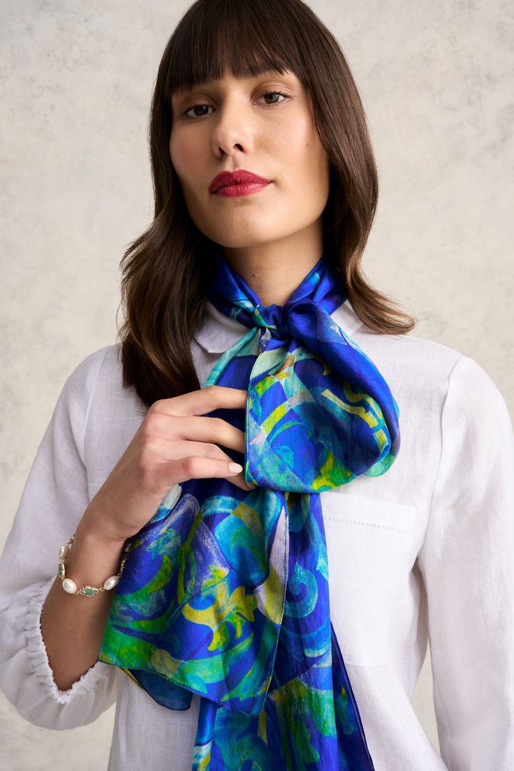 Back by popular demand, our Carrelage Silk Scarf has had a re-colour. Now with a blue base and bright neons, this scarf offers a luxurious feel against the skin. Lightweight, this accessory will enliven many outfits in your summer capsule. Blue Silk Scarves For Spring, Blue Silk Scarf For Beach In Spring, Chic Blue Silk Scarf For Spring, Elegant Blue Silk Scarf For Beach, Blue Trendy Silk Scarf For Spring, Trendy Blue Scarves For Summer, Summer Blue Silk Scarf, Trendy Blue Silk Scarves, Trendy Blue Silk Scarf