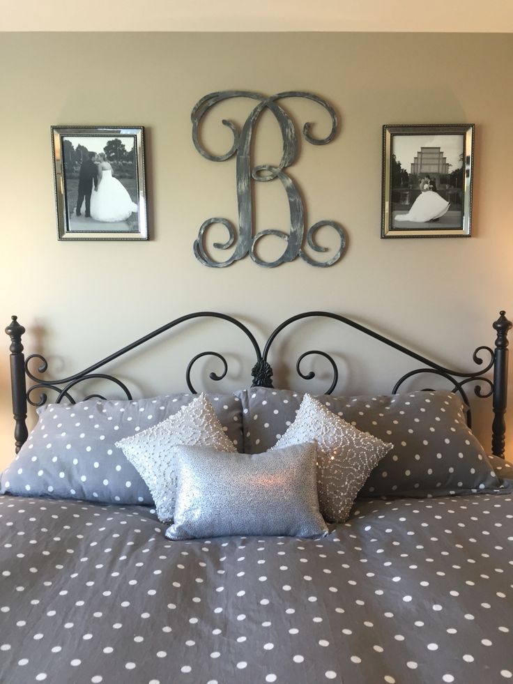 Idea for above the bed in master bedroom. Monogram and picture frames