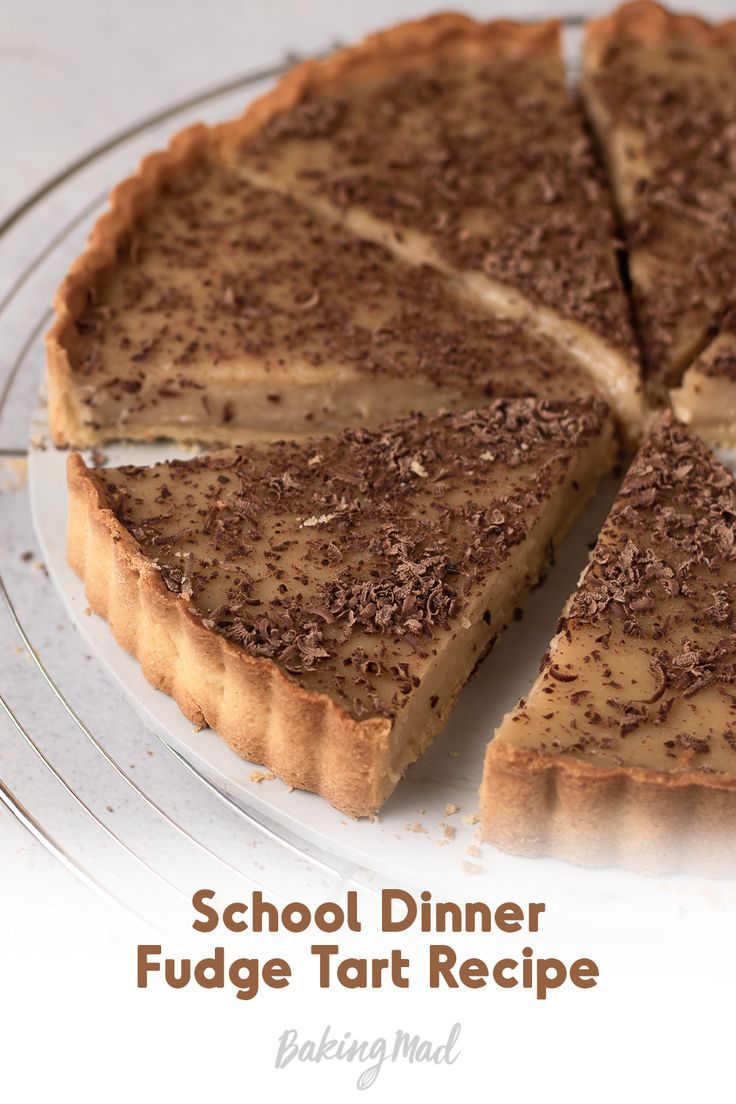 a close up of a pie on a plate with the words school dinner fudge tart recipe