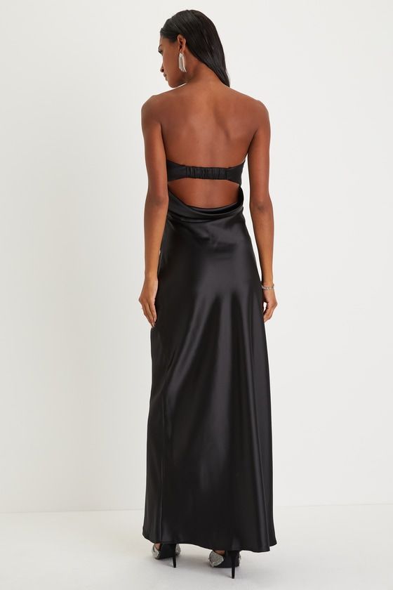 You'll be the classiest invite of the night in the Lulus Exquisite Shine Black Satin Rhinestone Strapless Maxi Dress! Sleek woven satin shapes this luxurious dress that features a strapless bodice with a rhinestone-trimmed sweetheart neckline (with hidden no-slip strips) that peaks out from a cute foldover detail. The figure-flattering slip silhouette falls to an elegant maxi hem. Hidden side zipper/clasp. Fit: This garment fits true to size. Length: Floor length. Size medium measures 52.25" from top to bottom. Bust: Great for any cup size. Waist: Fitted - very fitted at natural waist. Hip: Loosely Fitted. Undergarments: May be worn with an adhesive bra, petals, or no bra. Fabric: Fabric has no stretch. Lined. Shell: 97% Polyester, 3% Spandex. Lining: 95% Polyester, 5% Spandex. Exclusive O Black Corset Long Dress, Black Long Silk Dress, Black Satin Bridesmaid Dresses, Strapless Black Prom Dress, Black Formal Dress Long, Black Long Dress Elegant, Black Satin Bridesmaid Dress, Black Long Dresses, Black Satin Prom Dress