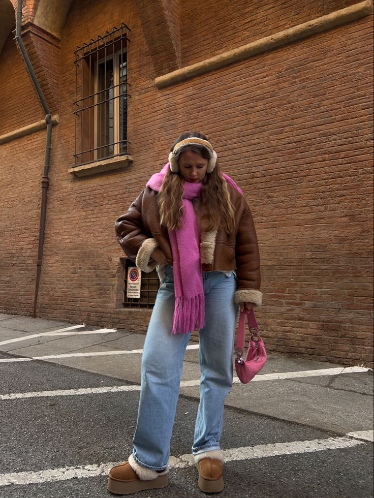 Brown jacket, winter jacket, winter outfit, winter accessories, winter scarf, pink scarf, pink bag, uggs, ugg outfit, winter outfit, cold season outfit, vintage jacket, earmuffs,ootd Trendy Jackets 2023, Pink And Brown Winter Outfit, Pastel Scarf Outfit, Brown Jacket Winter Outfit, Brown Winter Jacket Outfit, Pink Bag Outfit Winter, Pink Earmuffs Outfit, Winter Outfit Colorful, Jacket And Scarf Outfit