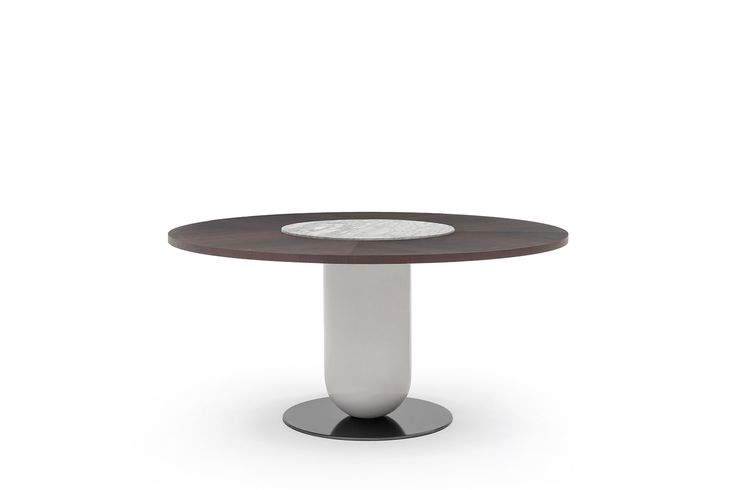 a round table with a white base and brown top