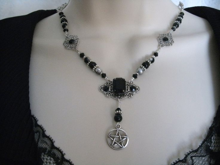 "This beautiful necklace has black Czech glass beads, pewter silver accent beads, silver plated filigree accents, black rhinestones, silver plated filigree pendant with black faceted glass setting and a pewter silver pentacle. 18\" long. Toggle clasp." Gothic Silver Necklaces For Festival, Handmade Gothic Antique Silver Necklace, Gothic Silver Jewelry For Festival, Gothic Silver Festival Jewelry, Gothic Pewter Jewelry In Silver, Gothic Silver Pewter Jewelry, Silver Gothic Jewelry For Jewelry Making, Gothic Nickel-free Jewelry For Festivals, Adjustable Gothic Antique Silver Necklace