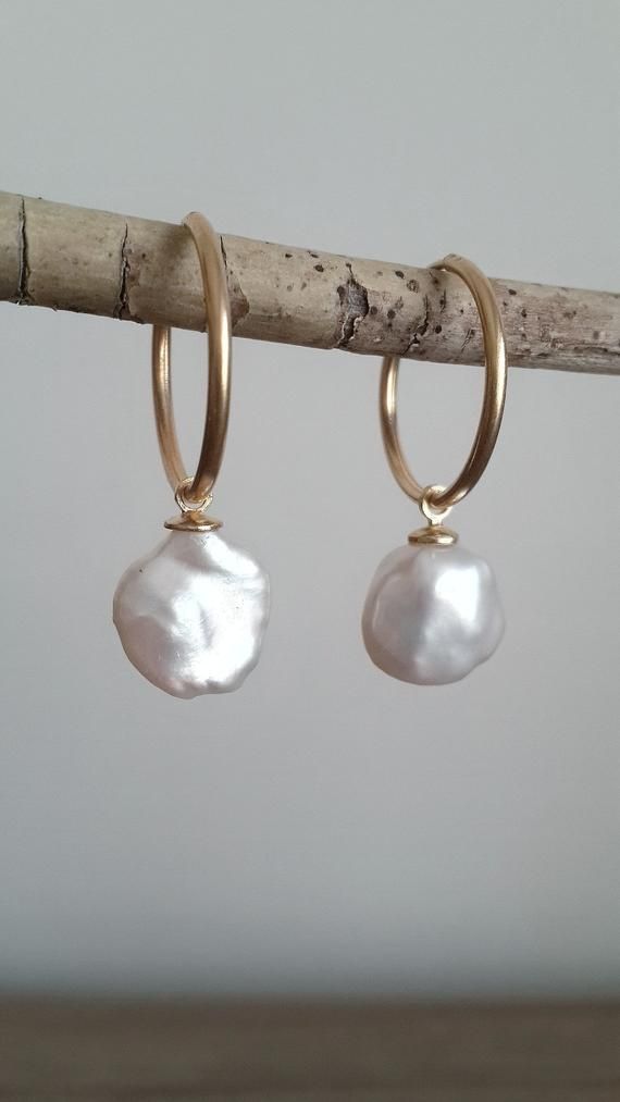 This charming sterling silver baroque pearl earrings are handmade and unique. Because of this, there may be a small difference in each piece. I used sterling silver (925k) and baroque pearl and than I made gold plated. This lovely minimal hoop earrings are suitable daily and night use. Baroque pearl can be different from each other because of it's a natural pearl. You can purchase  this lovely baroque pearl earrings as a bridemaid gift idea. Also it can be a stylish gift alternative for christma Small Hoop Pearl Pendant Jewelry For Gift, Handmade Pearl Earrings For Anniversary, Hoop Pearl Pendant Jewelry For Wedding, Small Hoop Earrings With Pearl Pendant For Gift, Small Hoop Earrings With Pearl Pendant As Gift, Hoop Earrings With Pearl Pendant As Gift, Wedding Hoop Earrings With Pearl Pendant, Gift Hoop Earrings With Pearl Pendant And Dangle, Hoop Pearl Drop Earrings As Gift