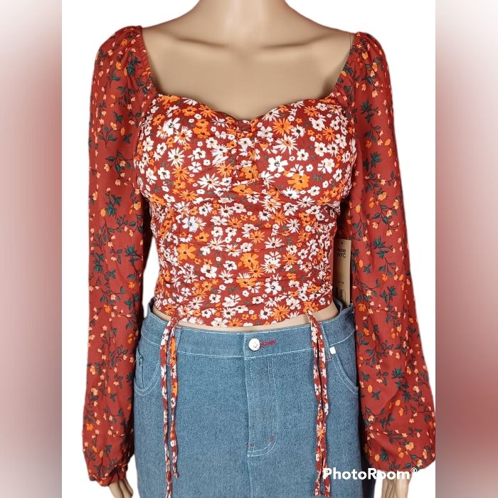 New With Tags, Orange, Floral, Flowy, Long Sleeve Blouse. Color Is Dark Orange With A White And Light Orange Floral Pattern. Brand Is Madden Nyc. Has Built In Bra Padding. Size:Large(11-13) Measurements- Pit To Pit:16in. Length:17in. Sleeve Length:25.5in. New With No Flaws Floral Print Crop Top For Fall, Trendy Fitted Floral Print Blouse, Fitted Casual Blouse With Floral Print, Fitted Floral Print Peasant Top For Spring, Fitted Peasant Top For Brunch In Fall, Fitted Peasant Top For Fall Brunch, Trendy Non-stretch Floral Print Blouse, Bohemian Fitted Crop Top Blouse, Fitted Floral Print Blouse For Vacation