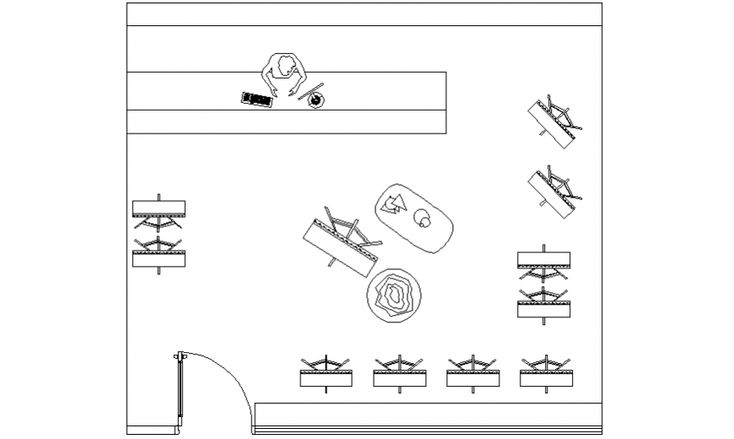 the floor plan for an office with several tables and chairs