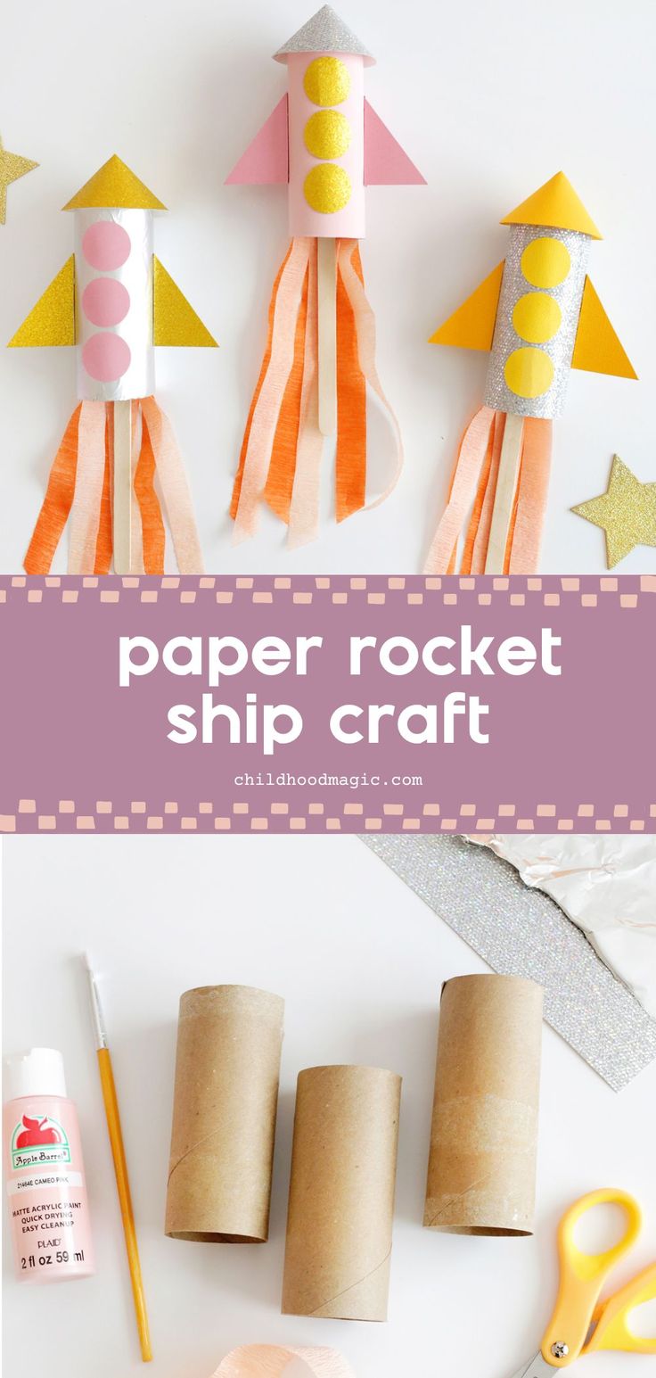 paper rocket ship craft for kids to make with toilet paper rolls and construction supplies on the table