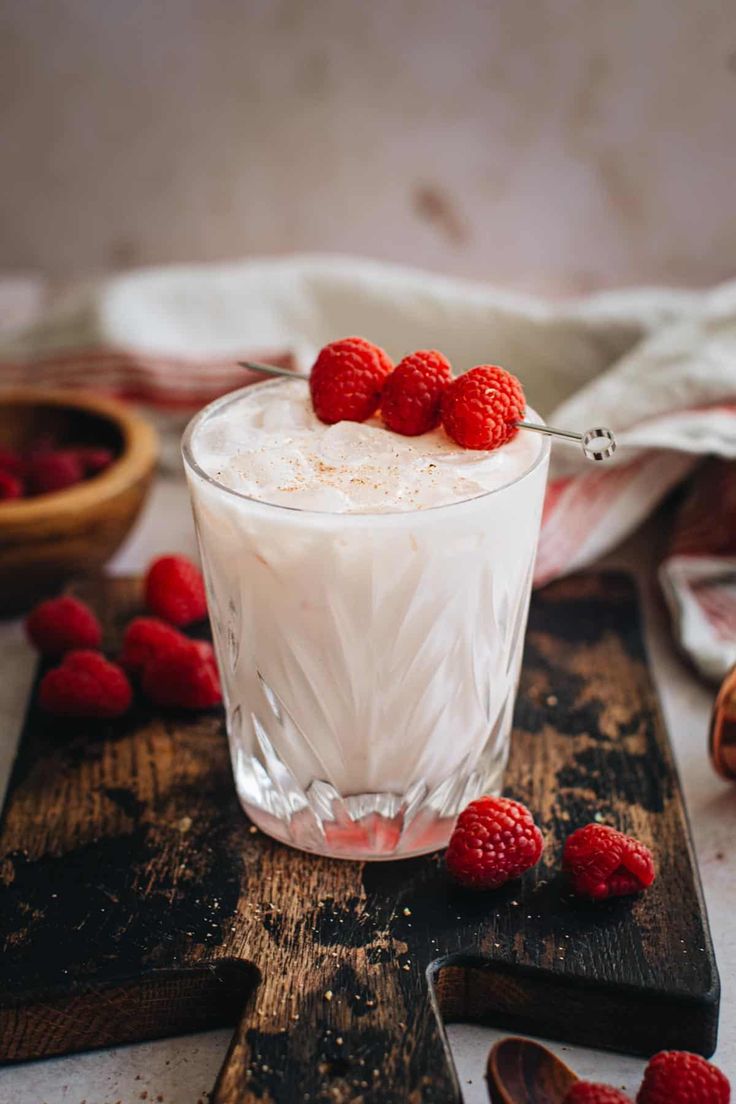 The Nuts and Berries Drink is a sweet and creamy cocktail that combines the flavors of hazelnut liqueur, Chambord, cream, and fresh raspberries. Nuts And Berries Drink, Nuts And Berries Cocktail, Chambord Cream, Nuts And Berries, Creamy Cocktails, Berry Drinks, Raspberry Liqueur, Raspberry Syrup, Fresh Raspberries