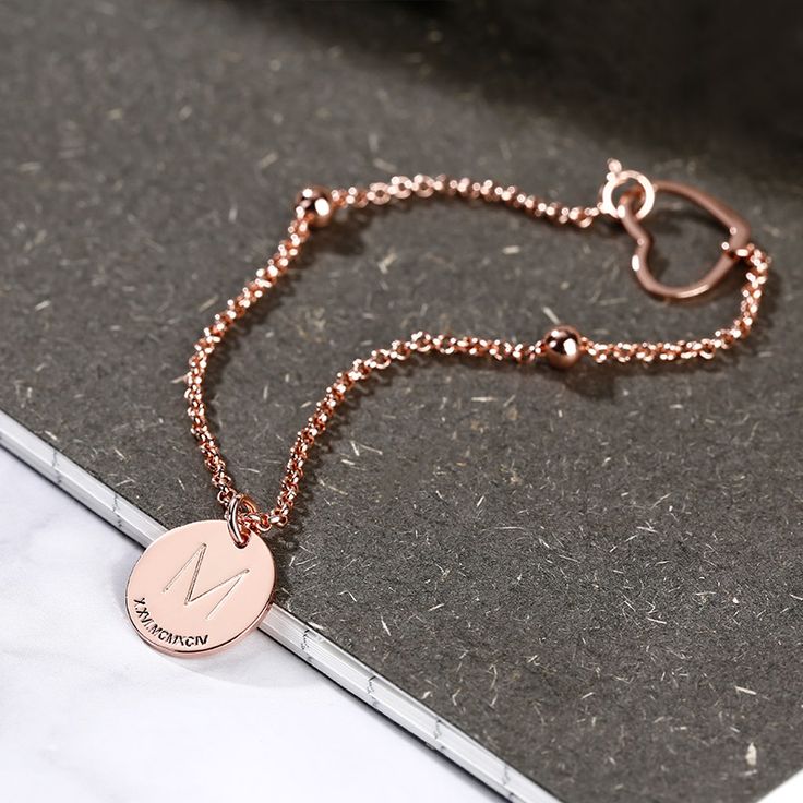 A delightful touch to any attire, the initial personalized bracelet makes a big impression. Meaningful and stylish, it offers lots of details to love. A true classic that's perfect for pairing with a variety of fashions, it makes a meaningful signature piece for yourself or someone special.Material: 925 SilverPlating Color: Silver, Yellow Gold, Rose Gold Elegant Monogram Bracelet For Personalized Gift, Classic Rose Gold Metal Bracelets, Elegant Adjustable Initials Charm Bracelet, Elegant Monogram Name Bracelet For Personalized Gift, Elegant Monogram Name Bracelet As Personalized Gift, Elegant Monogrammed Name Bracelet For Personalized Gift, Rose Gold Charm Bracelet With Jubilee Bracelet, Rose Gold Charm Bracelet With Jubilee Detail, Elegant Silver Bracelets With Initials