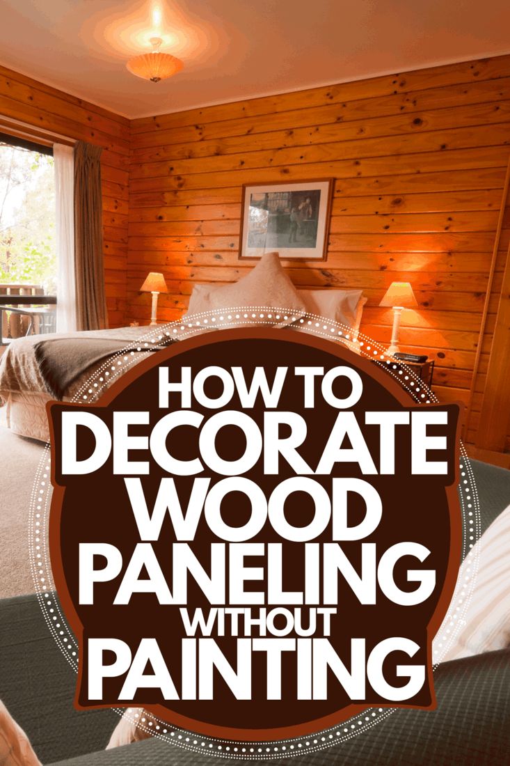 how to decorate wood paneling without painting in the bedroom or living room with text overlay that reads, how to decorate wood paneling without painting