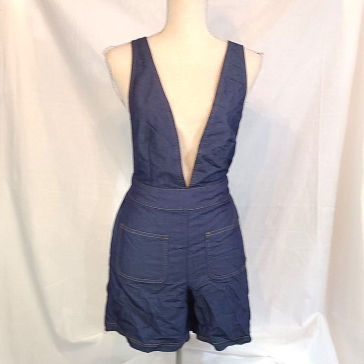 Nwot Like An Angel Blue Jean Juniors Women's Small Blue Denim Romper Jumper Jumpsuit All Measurements Taken While Item Is Laying Flat: Waist: 13.5" Inseam: 5" Length" 35.5" 2 Side Pockets...2 Breast Pockets...Belt Loops Blue Bib Front Denim Jumpsuit For Spring, Denim Bib Front Shortalls For Summer, Summer Denim Bib Front Bottoms, Blue Denim Jumpsuit With Bib Front For Spring, Spring Denim Blue Bib Front Shortalls, Spring Denim Bib Front Bottoms, Fitted Blue Denim Jumpsuit For Summer, Blue Fitted Denim Jumpsuit For Summer, Fitted Shortalls Overalls For Spring