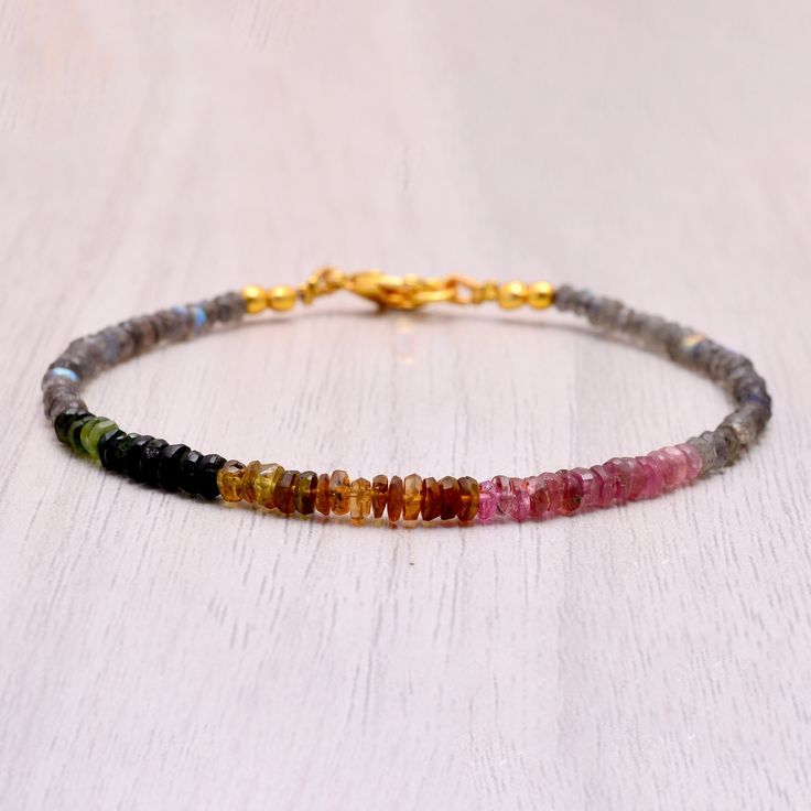 Labradorite & Tourmaline Bracelet, Dainty Beaded Multi Gemstone Jewelry Gemstone Bracelet, Gold Filled Or Sterling silver ,Gift For Her, Mother's Day Gift AAA Quality Please Feel Free To Contact If You Have Any Query. Orders are shipped within 1 business working day, excluding orders made on Sunday or national holidays. Domestic delivery takes 5-7 business days. International delivery takes 11-23 business days. PAYMENT METHOD : PayPal only Please send all payments within 7 days . Return policy: Bohemian Beaded Tourmaline Jewelry, Adjustable Tourmaline Gemstone Beads Jewelry, Tourmaline Gemstone Beaded Bracelets With Round Beads, Adjustable Spiritual Tourmaline Beaded Bracelets, Adjustable Tourmaline Beaded Bracelets With Gemstone Beads, Adjustable Tourmaline Bracelet Jewelry, Bohemian Tourmaline Round Beads Jewelry, Bohemian Tourmaline Bead Jewelry, Tourmaline Beaded Bracelets With Natural Stones