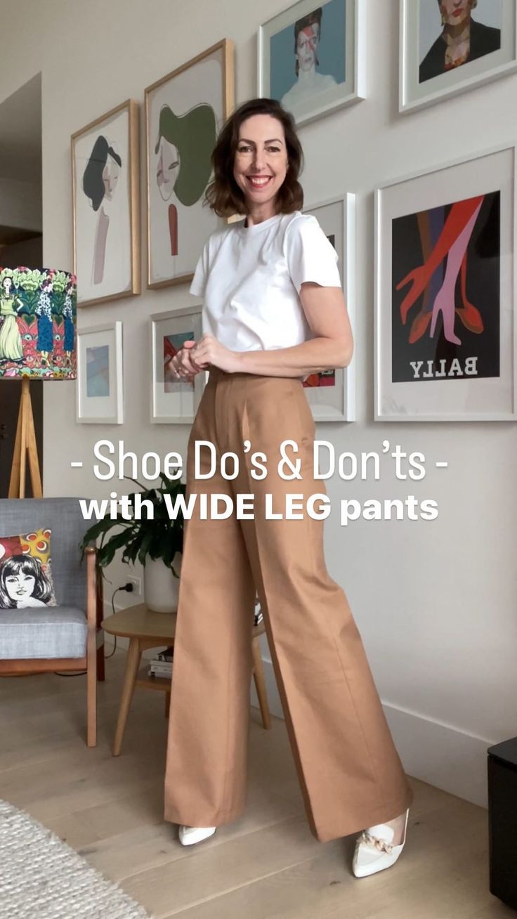 Wide Leg Pants With Converse, Dress Pants Outfits Black Women, Wide Leg Trousers With Flats, Wide Leg Pants Shoes Outfit, Silky Wide Leg Pants Outfit, Booties With Wide Leg Pants, Heels With Wide Leg Jeans, How To Style Wide Leg Trousers Work, How To Style Brown Trousers Women