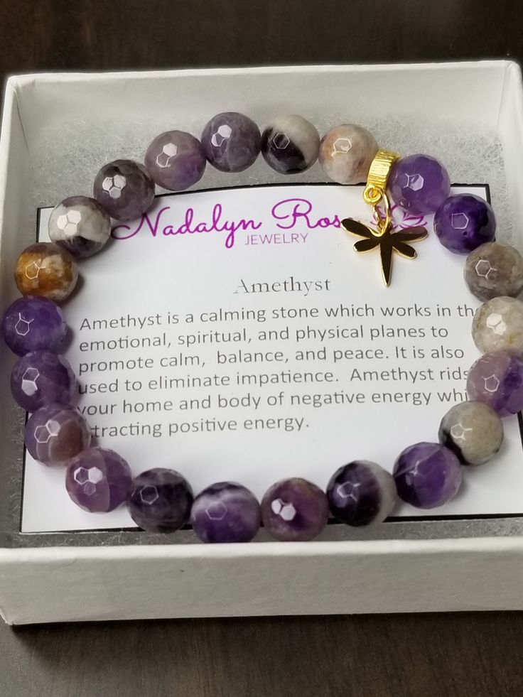 "Handmade Amethyst Beaded Bracelet, with 8mm beads, comes in a gift box with the stone meaning. Amethyst is a calming stone which works in the emotional, spiritual and physical planes to promote calm, balance, and peace. It is also used to eliminate impatience. Amethyst rids your home and body of negative energy while attracting positive energy. Available in the following sizes: 6.5\" Small 7\" Medium (most women) 7.5\" Large 8\" Extra Large Handmade Bracelet has been beaded with care and made w Amethyst 8mm Beads Jewelry Gift, Amethyst Crystal Bracelet As Spiritual Gift, Amethyst Crystal Bracelet For Spiritual Gift, Spiritual Amethyst Crystal Bracelet As Gift, Purple Crystal Bracelet With 8mm Beads As A Gift, Purple Bracelets With 8mm Beads As Gift, Purple 8mm Beads Bracelets As Gift, Spiritual Healing Stretch Bracelet With Faceted Beads, Spiritual Charm Bracelet With Faceted Beads As A Gift