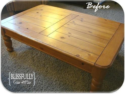 a coffee table made out of wood with the words blissfully painted on it's top