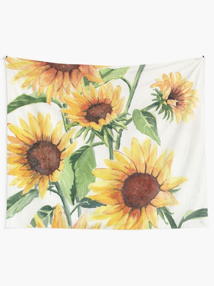 a sunflower tapestry hanging on the wall in front of a white background with green leaves