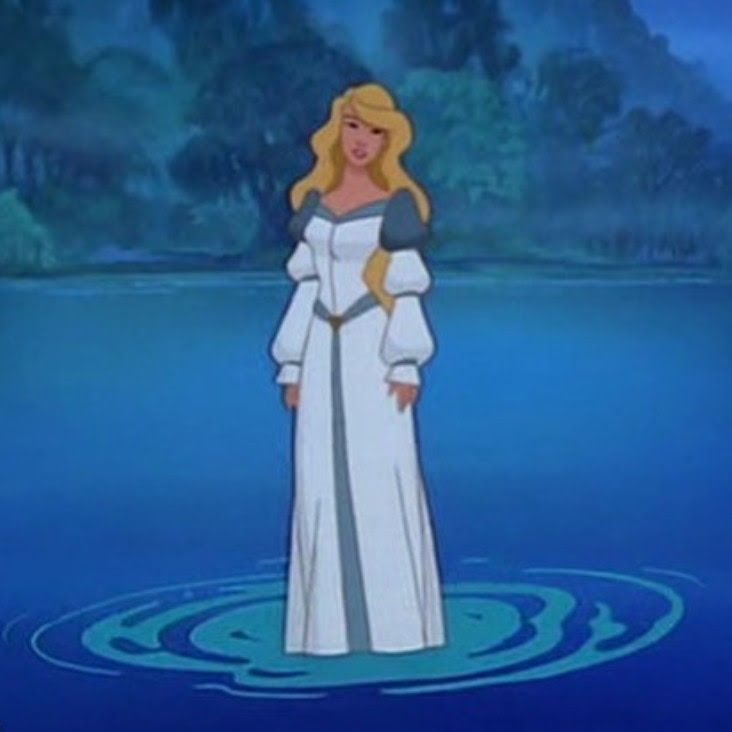 blond haired woman in white dress standing in water