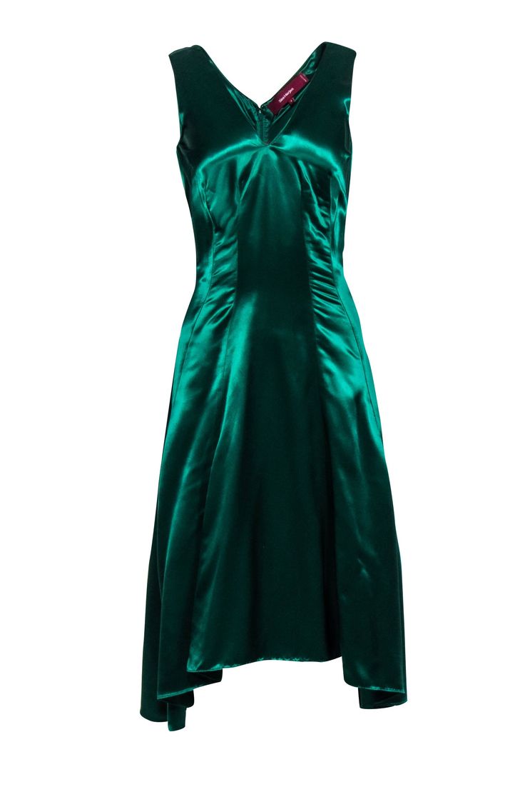 Look sleek and sexy this holiday season in a stunning Sies Marjan dress! An elegant option for a formal event or holiday cocktail party, this shimmering satin beauty will turn-heads with its gorgeous emerald green hue and elongated darts. Show off this midi's flattering high-low design with a pair of strappy metallic heels and plenty of gold jewelry. Size 4 100% Viscose Concealed back zipper V-neckline High-low hem Small snag on back near bottom Blemish at v-neckline Bust 32" Waist 30" Shoulder Fitted A-line Sleeveless Satin Dress, Fitted Satin A-line Sleeveless Dress, Holiday A-line Midi Dress For Night Out, Sleeveless Satin Evening Dress For Party Season, Sleeveless Satin Dress For Evening Party Season, Sleeveless Satin Dress For Evening Parties, Fitted Bodice Slip Dress, Midi Length For Party, Elegant Sleeveless Slip Dress For Prom, Fitted Bodice Slip Dress For Party, Midi Length