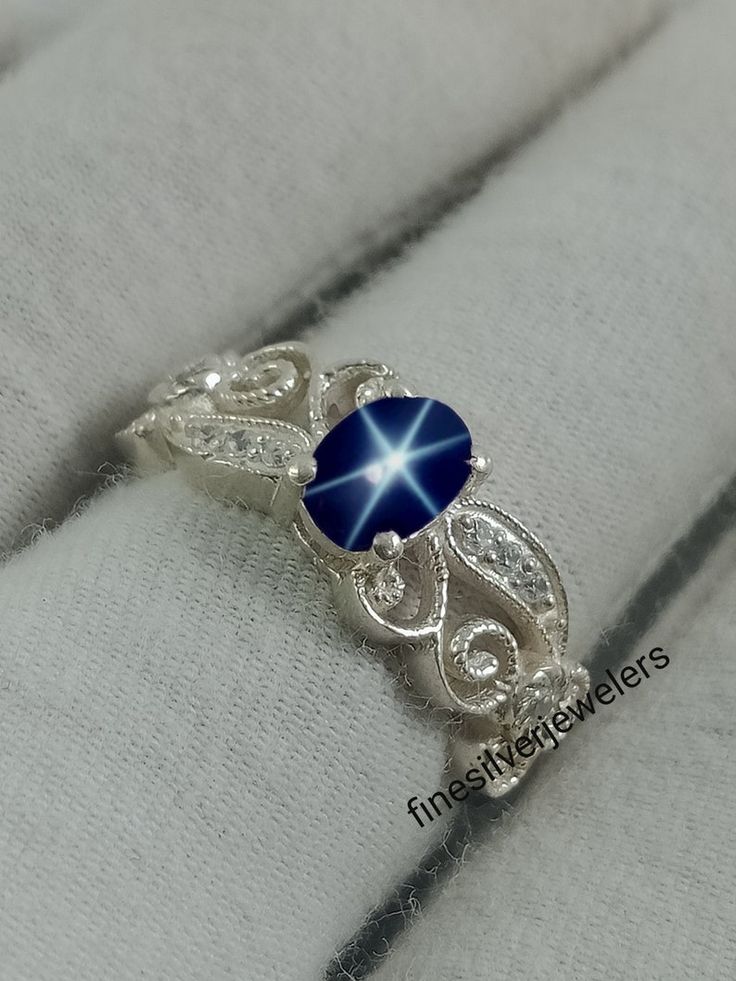 Silver Star-shaped Gemstone Ring, Silver Celestial Oval Jewelry, Celestial Style Sapphire Ring In Sterling Silver, Celestial Sterling Silver Sapphire Promise Ring, Sterling Silver Sapphire Star Jewelry, Celestial Sapphire Ring In Sterling Silver, Celestial Sapphire Sterling Silver Rings, Celestial Star Sapphire Jewelry, Star-shaped Silver Sapphire Promise Ring