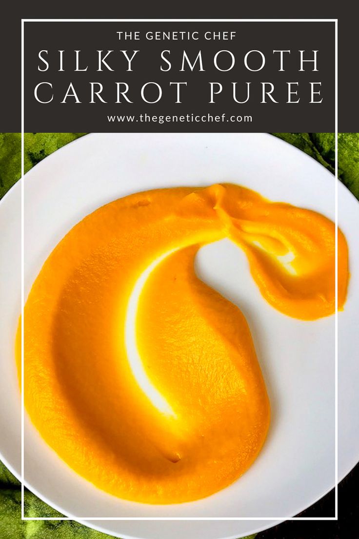 a white plate topped with carrot puree