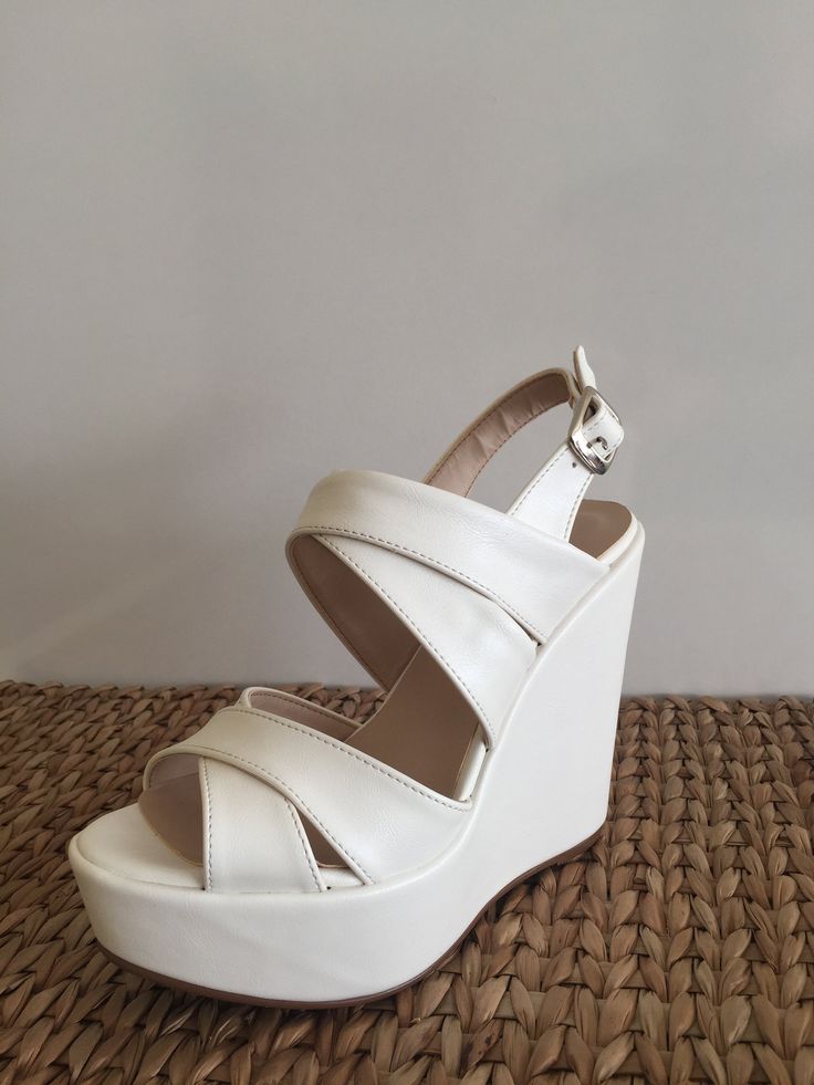 Now it has 6 cm heel length option too 6 cm , 8 cm , 10cm ,11cm ,12cm ,13 cm or 14 cm heel length options wedge Shoes Ivory , white color options These shoes will look great on you along with your wedding dress at your wedding. Everyone's eyes will be on you. Open Toe Wedge Sandals For Wedding, White Wedge Sandals With Heel Strap And Round Toe, White High Heel Platform Wedge Sandals, White Wedge Heel Sandals With Heel Strap, White Closed Toe Wedge Sandals With Platform, Wedding Closed Toe Synthetic Wedge Sandals, White High Heel Wedge Sandals For Party, Summer Wedding Platform Wedge Sandals, White Wedge Heel Sandals For Party