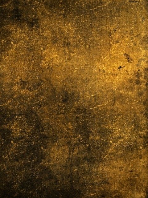 an old grungy textured background in gold and black