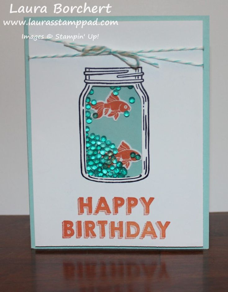 a happy birthday card with two goldfish in a mason jar on it's side