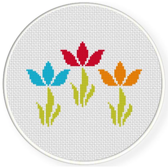 three colorful flowers on a white background cross - stitch pattern in the shape of a circle