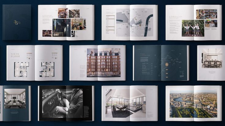 an open book with photographs on the cover and inside pages spread out to show architectural details