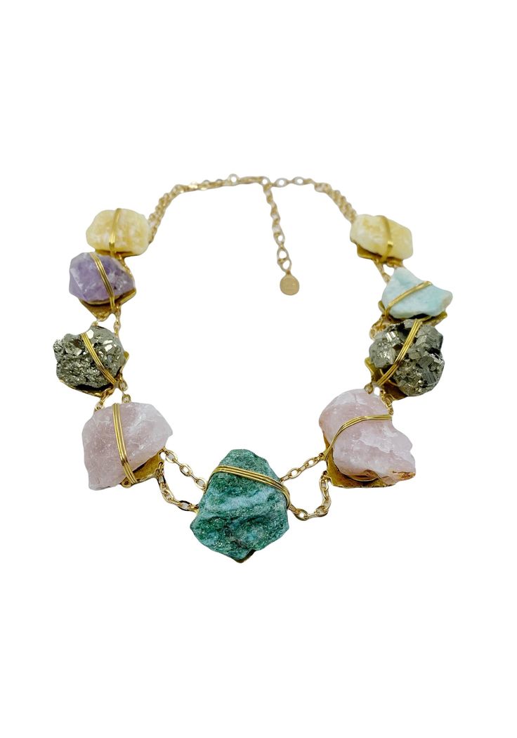 Stunning powerful mixed media necklace. This necklace makes a major statement by being bohemian yet goddess like all at the same time. Hand wrapped rough crystals in a lovely Georgian inspired silhouette. Perfect for party attire or over a white tee shirt. Very versatile. Features - Fuchsite- For heart healing, love and mica like sparkle. Yellow Calcite - for hope and motivation. Pyrite - For success and luck and golden sparkle with grounding properties. Rose Quartz - for peace, love, calm, roma Party Crystal Necklaces With Gemstone Accents, Metal Necklaces With Stones For Party, Party Jewelry With Gemstone Accents And Crystal, Party Necklaces With Stones In Metal, Mystical Metal Necklaces For Parties, Handmade Mystical Multicolor Jewelry, Bohemian Style Jewelry With Unique Variations For Party, Bohemian Party Jewelry With Unique Variations, Bohemian Style Party Jewelry With Unique Variations