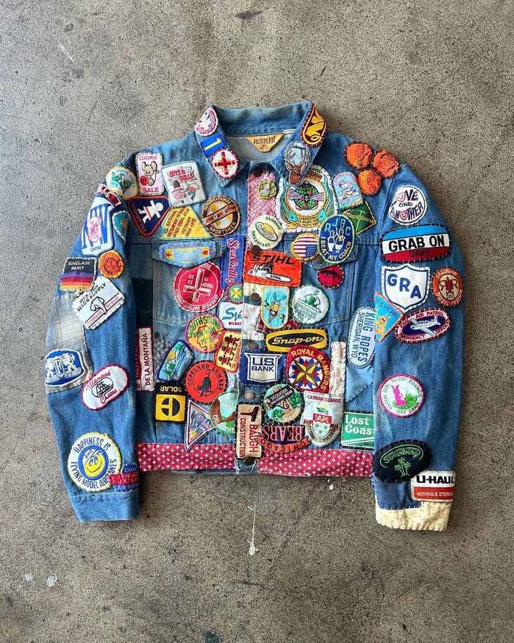 a denim jacket with patches on it