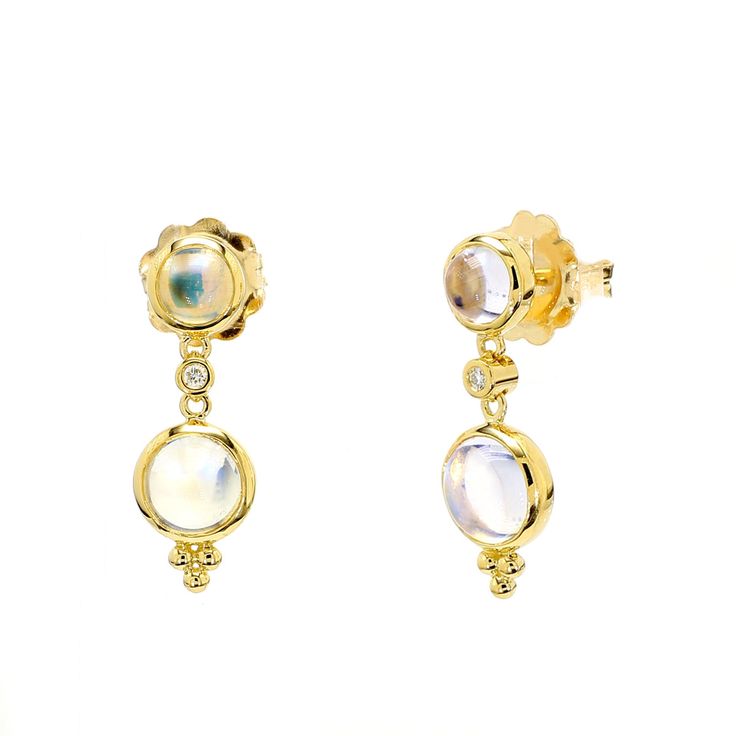 Once thought to be moonlight captured magically in solid form, Blue Moonstone has its own inner glow. The 18K Moon Drop Earrings feature moonstone in an elegant shape that is classic and timeless. Celestial Style Round Formal Earrings, Celestial Style Round Earrings For Formal Occasions, Celestial Round Earrings For Formal Occasions, Formal Celestial Round Earrings, Elegant Oval Jewelry With Moon Phase, Elegant Yellow Gold Jewelry With Moonstone, Elegant Moonstone Earrings For Formal Occasions, Elegant Yellow Gold Moonstone Jewelry, Elegant Moonstone Jewelry With Moon Phase Detail