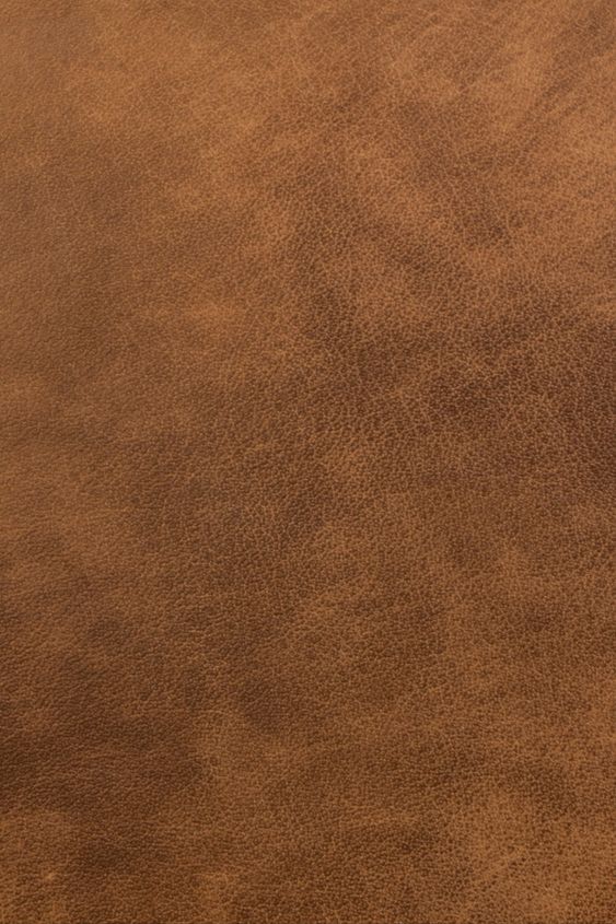 a brown leather textured surface that looks like it could be used as a background