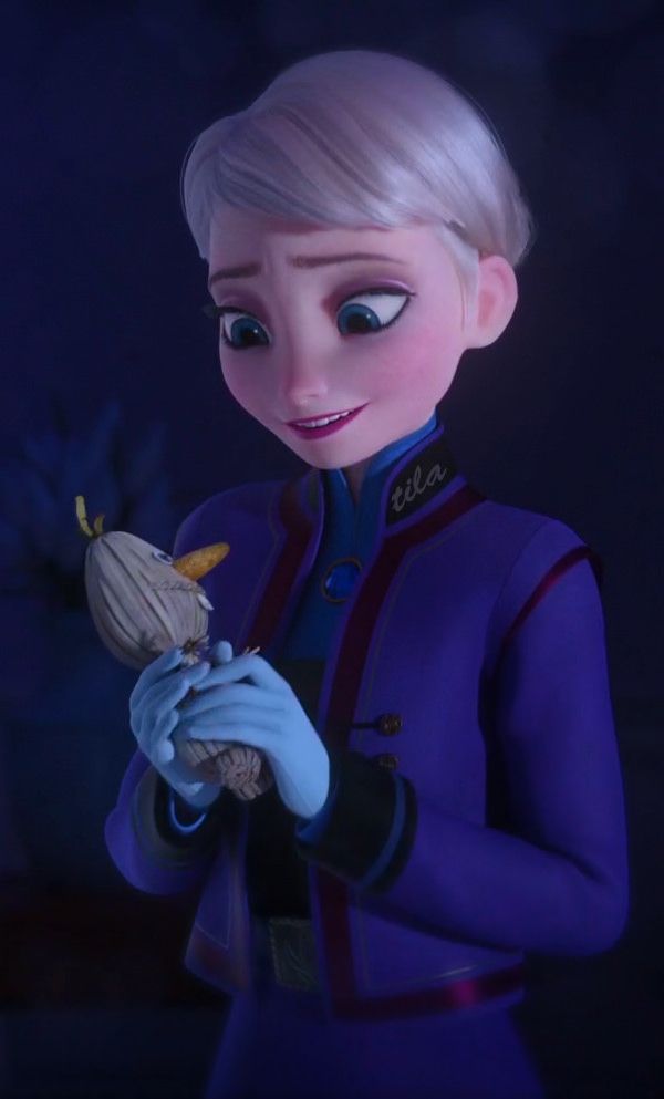 the frozen queen is holding an object in her hand