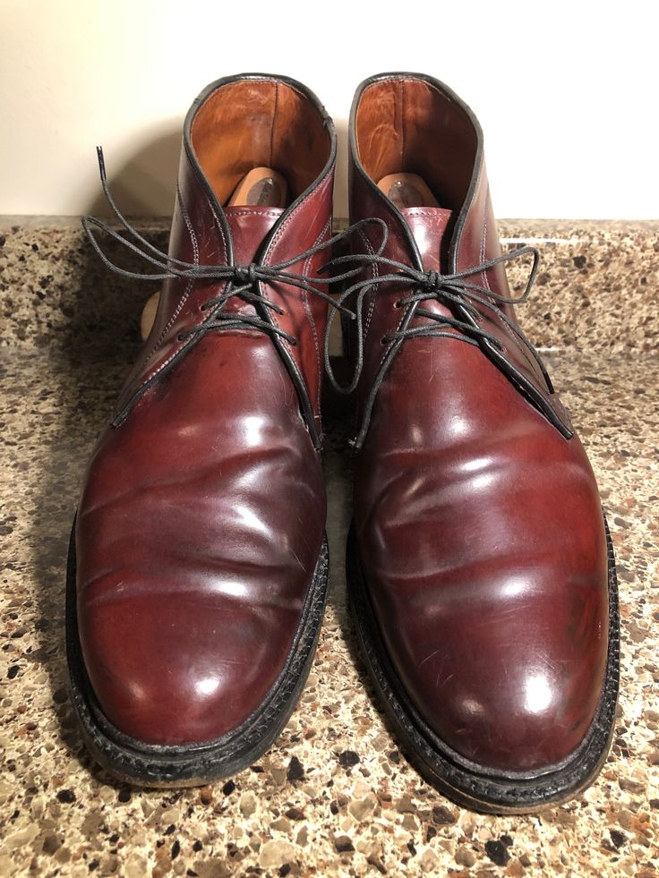 From time to time at Canadian Vintage Shoes we come across a pair of border-hopping American shoes or boots! Here is a wonderful pair of Made in the USA, Allen Edmonds, Shell Cordovan "Dundee" Chukka boots; Size 14D.  Their shell cordovan shoes and boots are some of the most highly sought-after men's footwear. There is very little wear to the heels or soles and the uppers and full leather lined interiors are in remarkable shape, with no cracks or tears. The boots are marked as 14D; a comfortable Shell Cordovan Shoes, Cordovan Shoes, American Shoes, Allen Edmonds, Shoes And Boots, Men's Footwear, Dundee, Mens Oxfords, Vintage Shoes