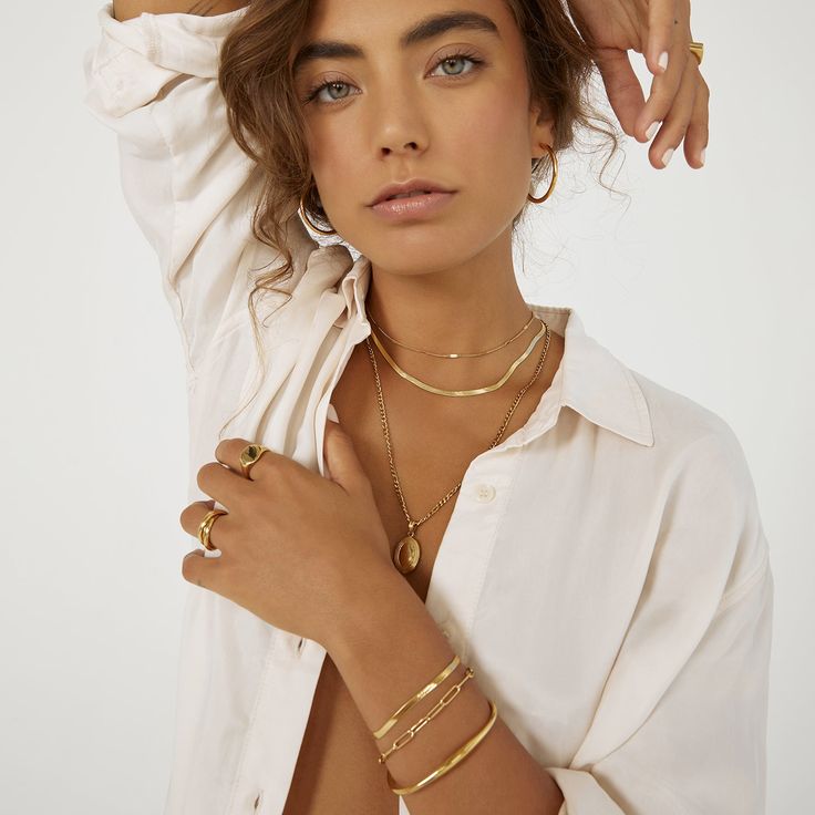 A truely elegant chain with a classy sense of style, our Willa Necklace is perfect for everyday sophistication! With 3 different length from a choker style to a long chain, Willa is designed to be stacked with any other gold or textured pieces to create the layering style of your dreams! 14k Gold (1 micron plating)  Stainless Steel Base  E-coating for a premium finish  Lead & Nickel Free  Tarnish-Free  Water Resistant Elegant Multi-strand Delicate Chain Jewelry, Minimalist Snake Chain Layered Necklace, Elegant Multi-strand Figaro Chain Jewelry, Minimalist Multi-strand Clavicle Chain Necklace, Minimalist Multi-strand Necklace With Adjustable Chain, Elegant Multi-strand Gold Plated Jewelry, Adjustable Metal Chain Jewelry For Layering, Minimalist Metal Layered Necklace For Everyday, Chic Metal Lariat Jewelry