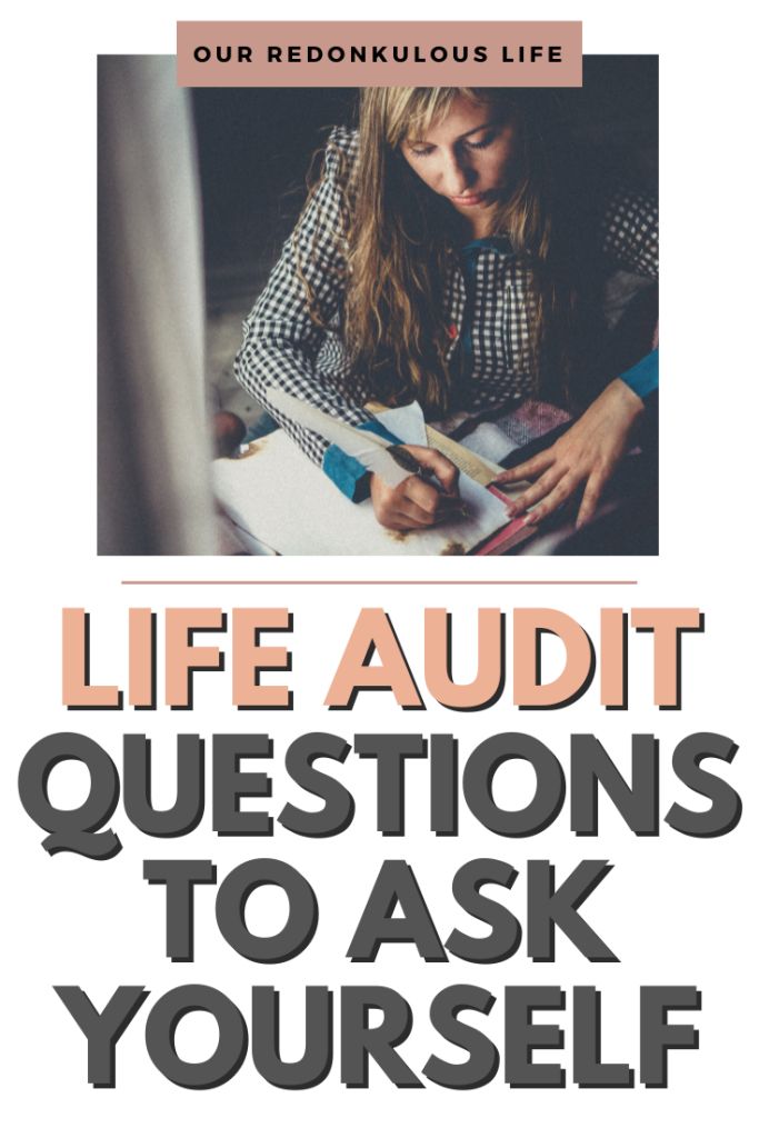 a woman writing on top of a book with the title life audit questions to ask yourself