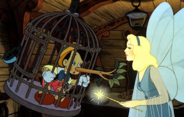 an animated image of a woman holding a bird in a cage with other people around her