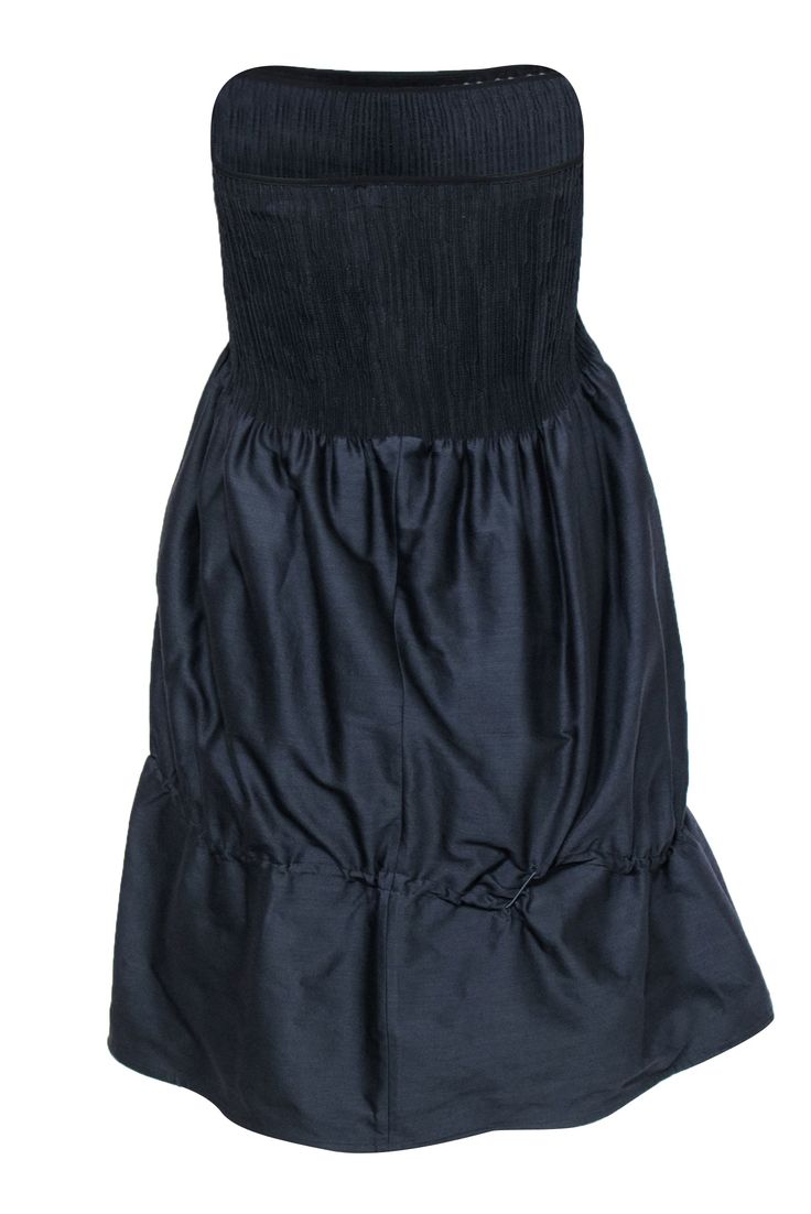 Go for a playful LBD with this strapless cocktail dress from Marithe + Francois Girbaud! Made with a smocked bodice, this is the perfect piece to wear with bright pumps and a sultry smoky eye for a Friday night look that is sure to stun. Size 4 (IT 42) Made in Italy 60% Wool, 21% Silk, 17% Viscose, 2% Other fibers Fitted silhouette Bubble skirt Smocked, strapless bodice No closures, smocking creates stretch Waist 26" Bust 26" Total length 29" Party Dress With Smocked Bodice, Knee-length, Party Mini Length Fitted Smocked Dress, Party Mini-length Fitted Smocked Dress, Fitted Smocked Mini Dress For Party, Chic Fitted Strapless Smocked Dress, Fitted Smock Dress For Party, Party Strapless Dress With Smocked Bodice, Fitted Strapless Dress With Smocked Back, Fitted Ruched Smocked Dress For Party