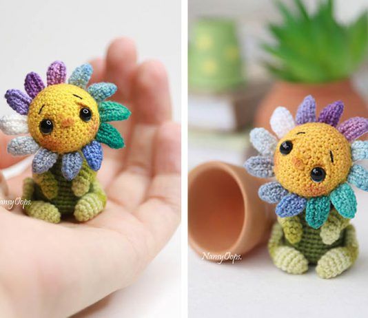 the tiny crocheted flower is being held up by someone's hand,