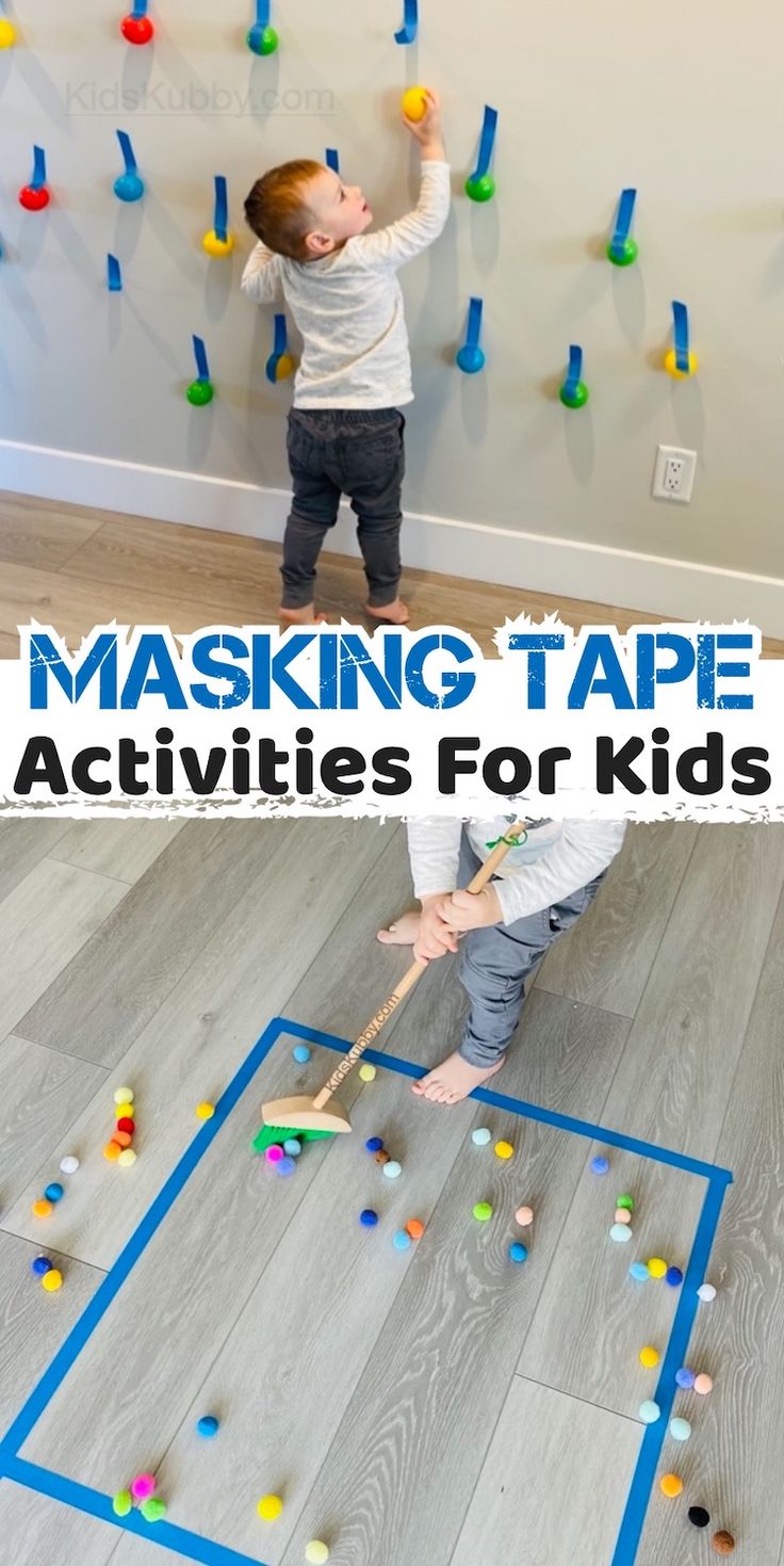 a young boy is playing with colored tape on the floor and has his hands in the air