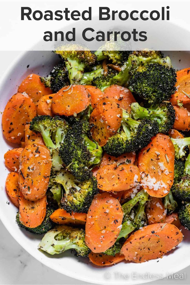 roasted broccoli and carrots in a white bowl