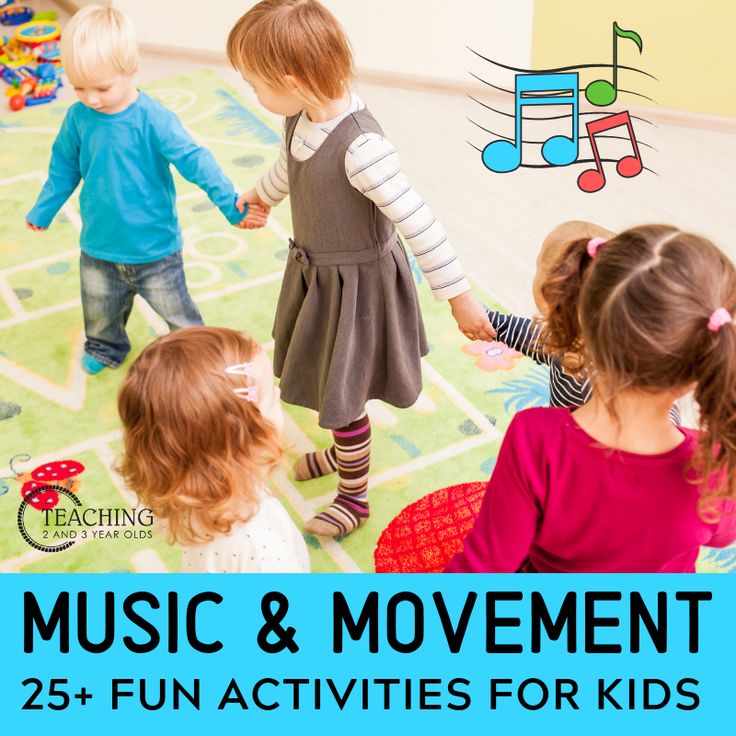 children playing with music and movement toys on the floor