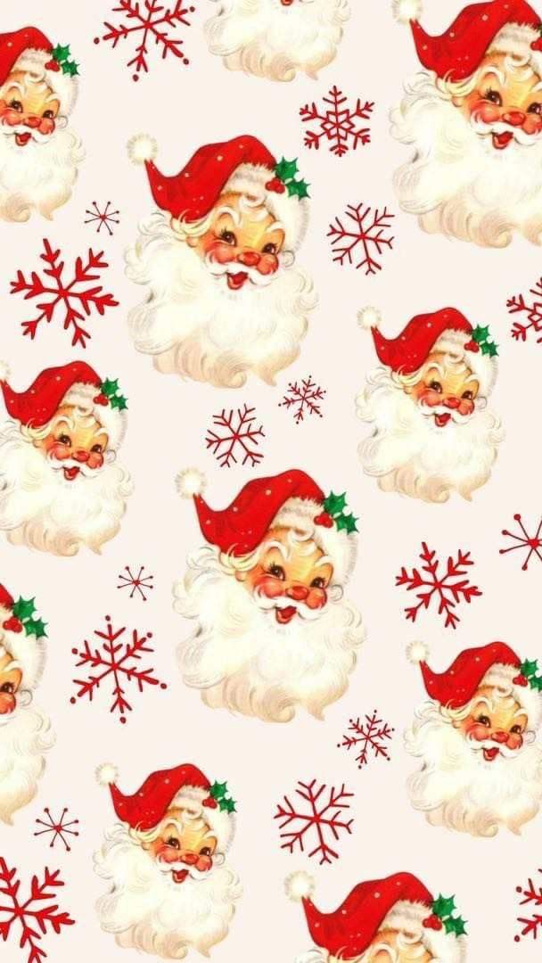 a santa clause pattern with snowflakes and red hats on it's head