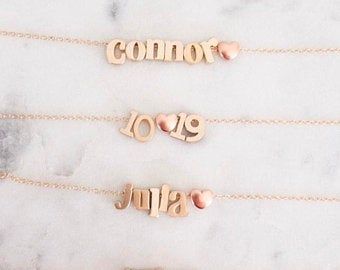 Personalized Gift name necklace Gold Necklace Name Jewelry | Etsy Pink Name Necklace For Valentine's Day Gift, Custom Text Necklace For Valentine's Day Gift, Valentine's Day Necklace With Custom Text, Personalized Name Necklace As A Gift, Pink Nameplate Jewelry For Gifts, Pink Nameplate Jewelry For Gift, Rose Gold Name Necklace For Gifts, Cute Personalized Name Necklaces For Birthday, Cute Personalized Adjustable Name Necklace