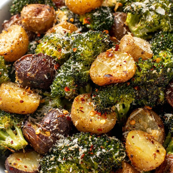 broccoli and potatoes with parmesan sprinkles in a bowl