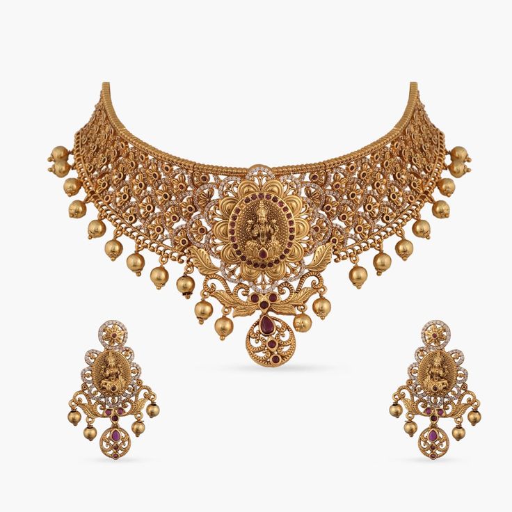 Neelam Antique Choker Set Gold Hallmarked Chandbali Temple Necklace, Gold Hallmarked Kundan Necklace For Diwali, Gold Plated Tilla Temple Jewelry, Antique Gold Temple Necklace With Intricate Design As Gift, Antique Gold Elegant Temple Necklace For Wedding, Elegant Antique Gold Temple Necklace For Wedding, Ornate Chandbali Brass Jewelry, Diwali Heavy Gold Plated Jewelry, Diwali Temple Jewelry In Gold Plated